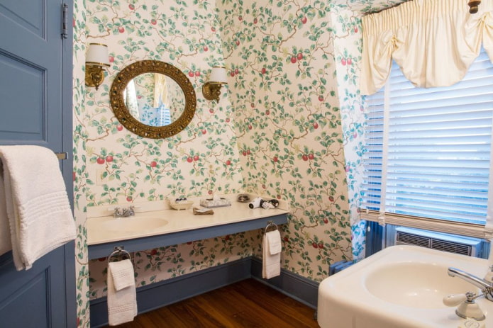 Bathroom with blinds and a round mirror