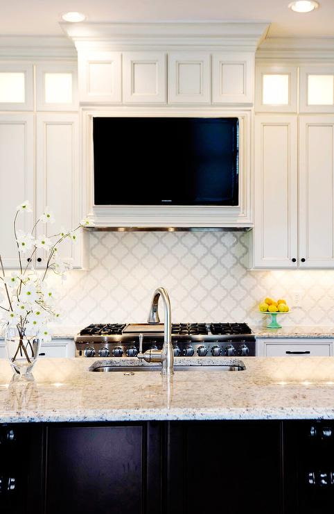 TV above the hood in the kitchen