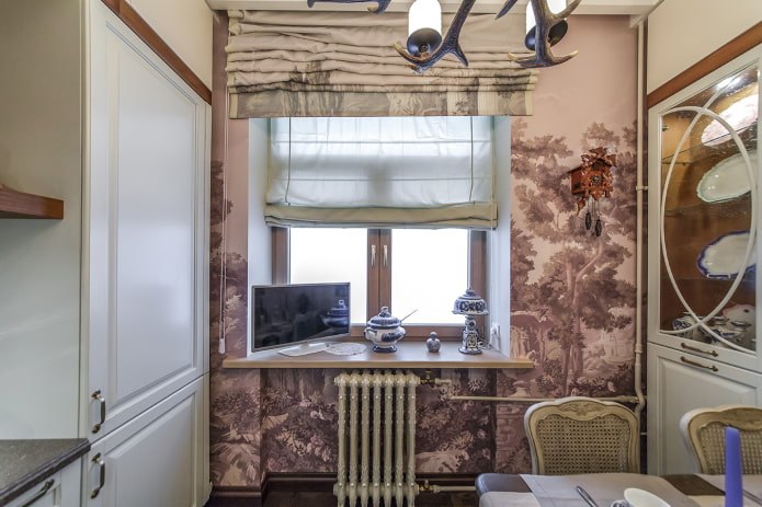 TV on the window sill in the kitchen