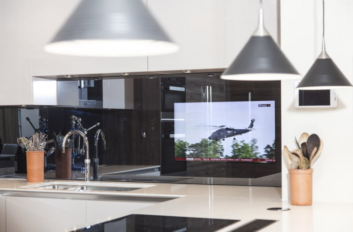 TV above the sink in the kitchen