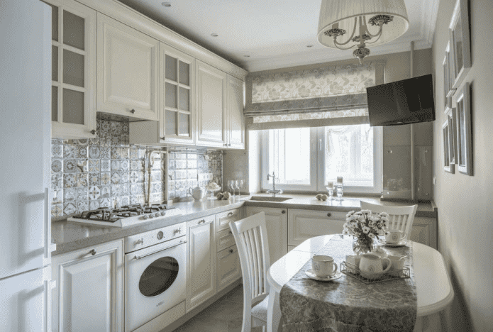 TV in the interior of a small kitchen