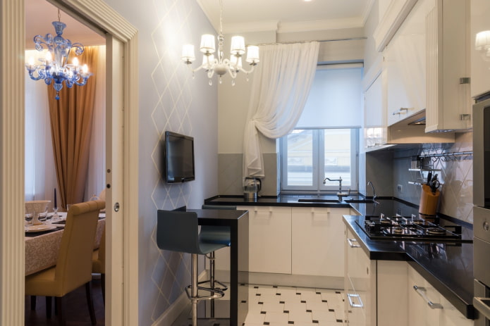 TV in the interior of a small kitchen