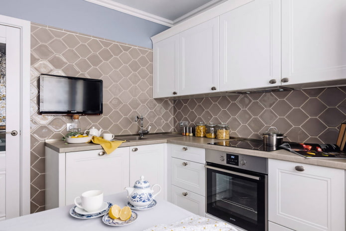 TV in the interior of a small kitchen
