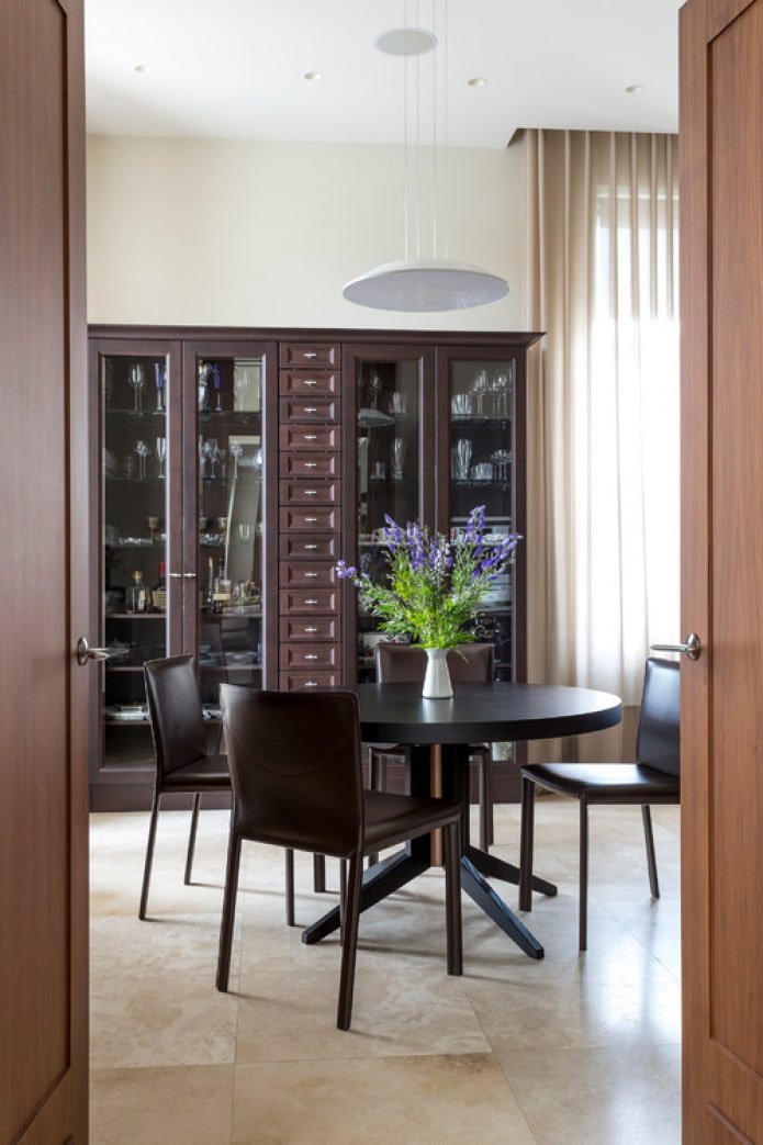 round dining table made of dark wood