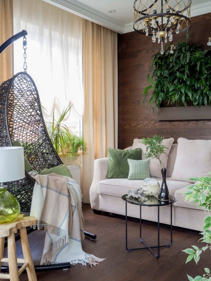 painting of plants above the sofa