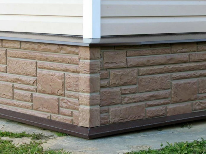 basement siding under stone