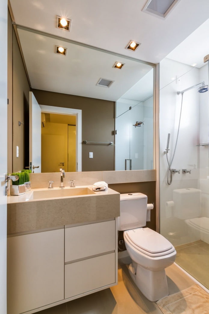 large mirror in a small bathroom