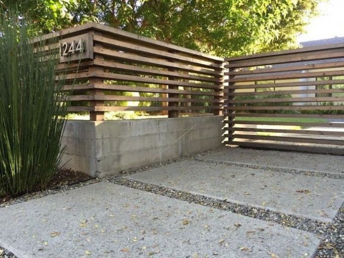Wood and concrete fence