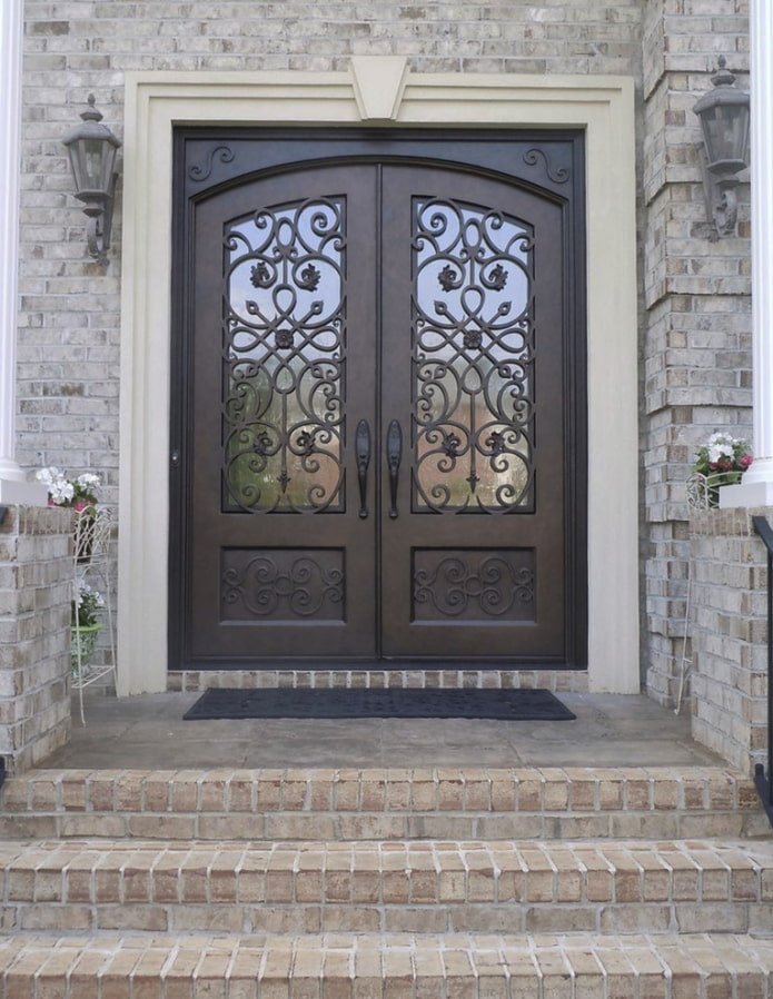 entrance forged doors in the exterior