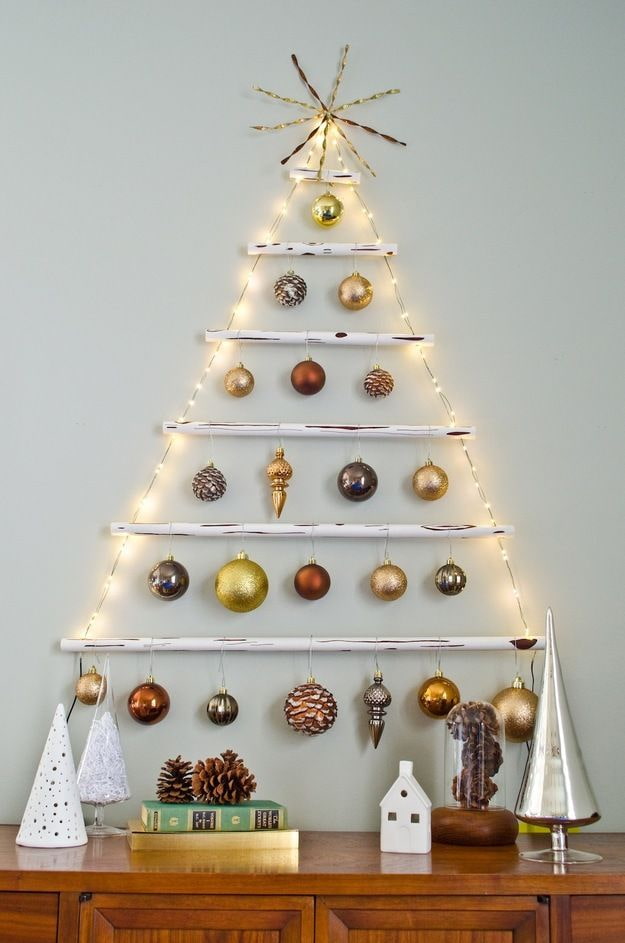 Christmas tree made of sticks, balls and garland