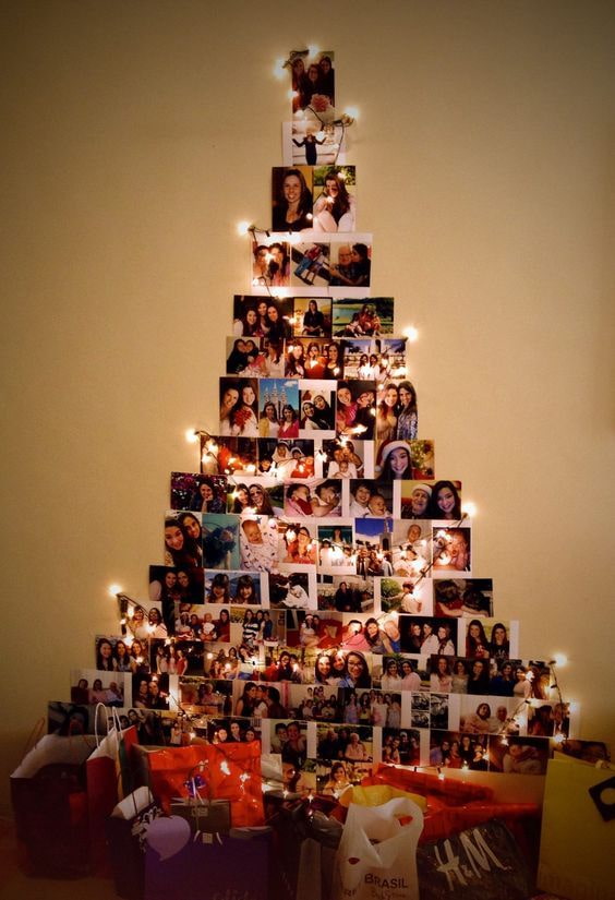 A Christmas tree made of photos on garlands