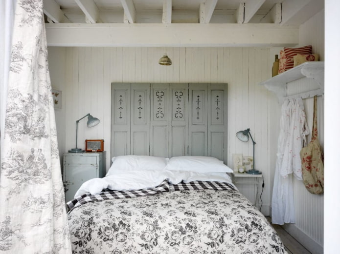 Antique doors near the bed 