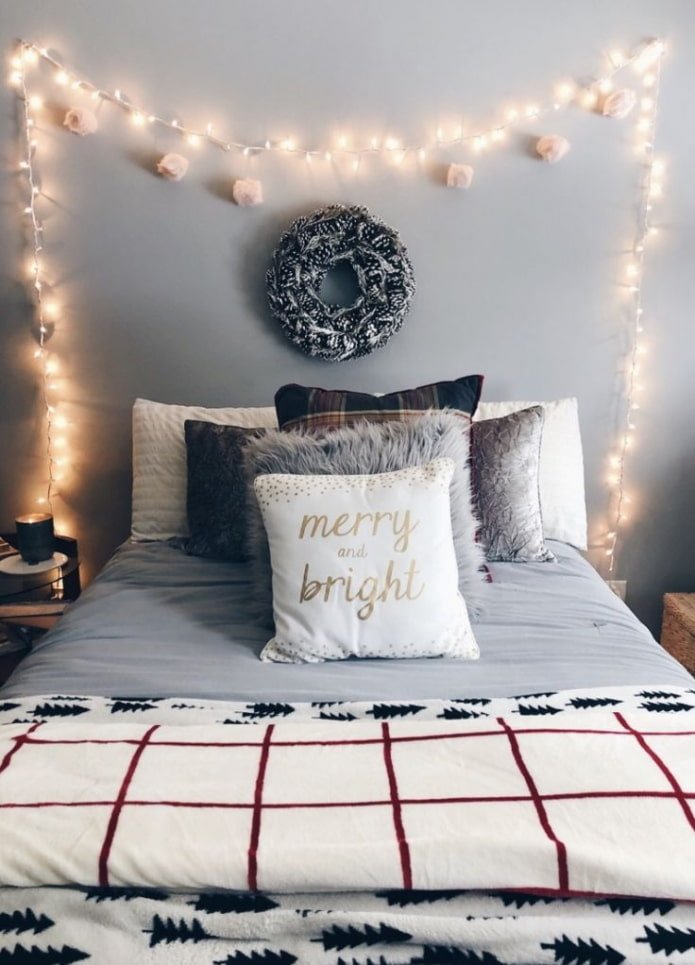 Framing the headboard with garlands