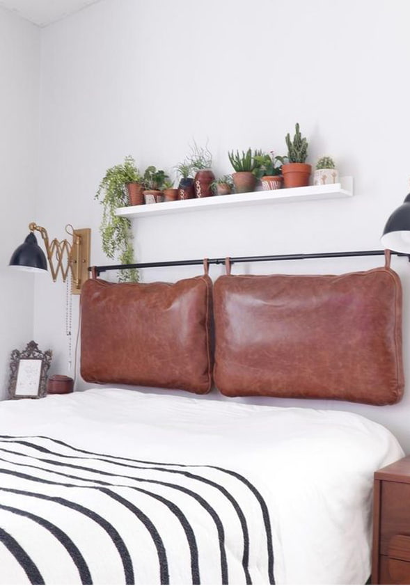 Leather pillows at the headboard