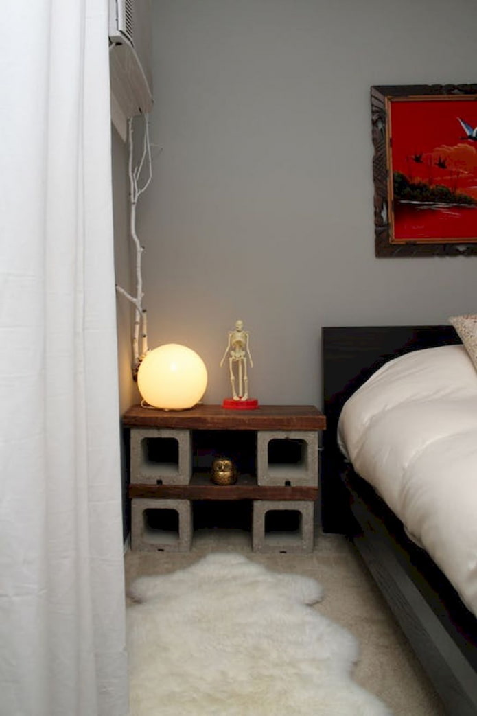 pedestal made of concrete blocks with wooden shelves