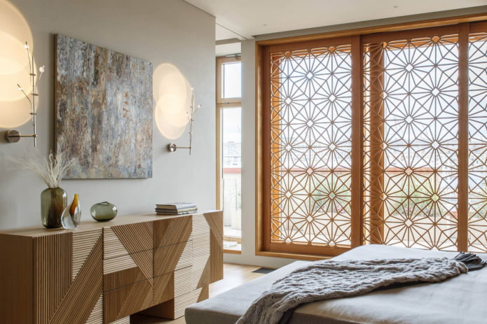 decorative screen on the window in the bedroom