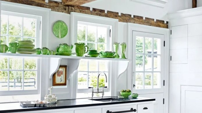 shelves with dishes on the window