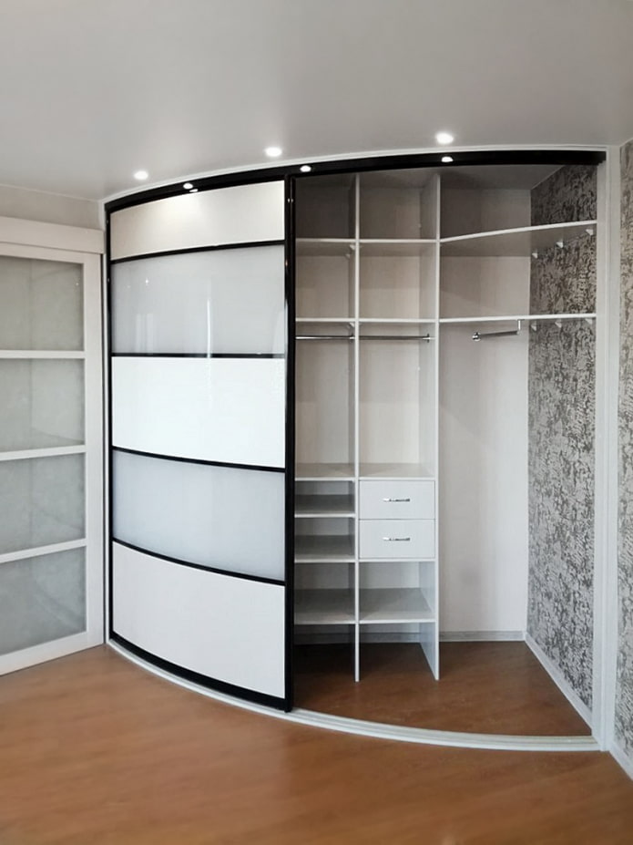 Round wardrobe with shelves