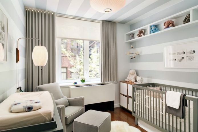 gray and white wallpaper in the nursery for a newborn