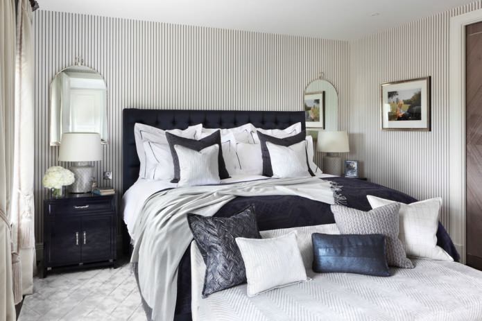 white striped wallpaper in the bedroom