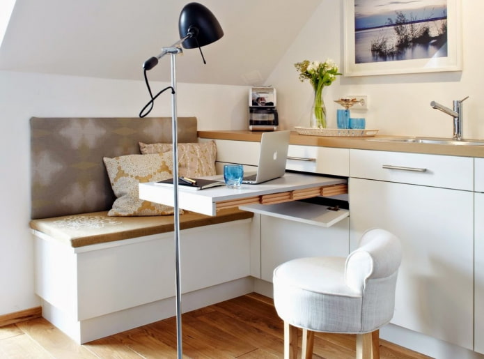 pull-out countertop built into the kitchen unit
