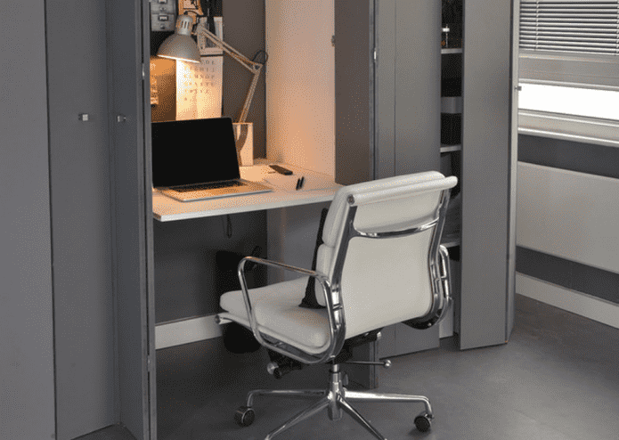 pull-out desk built into a cabinet