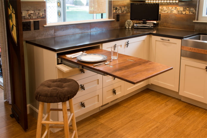 pull-out table combined with furniture