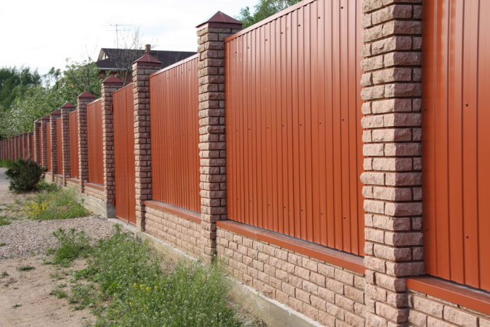 Brown fence made of profiled sheet