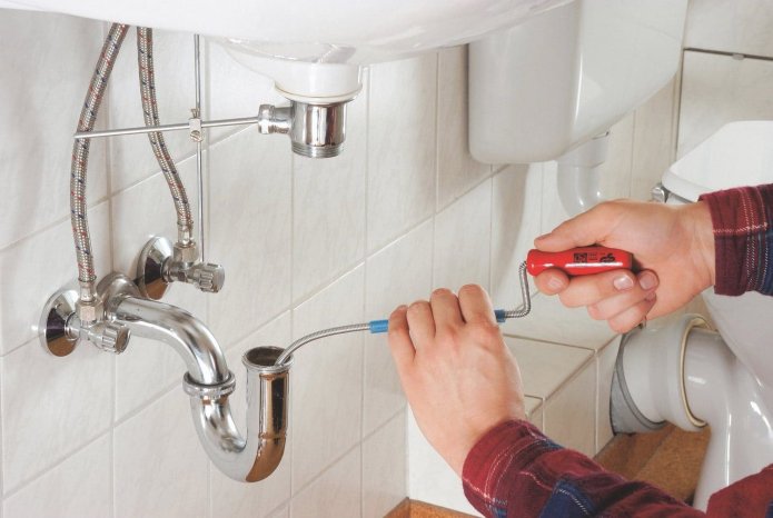 cleaning pipes in the bathroom