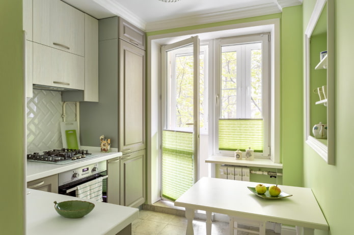 curtains in the kitchen interior in green tones