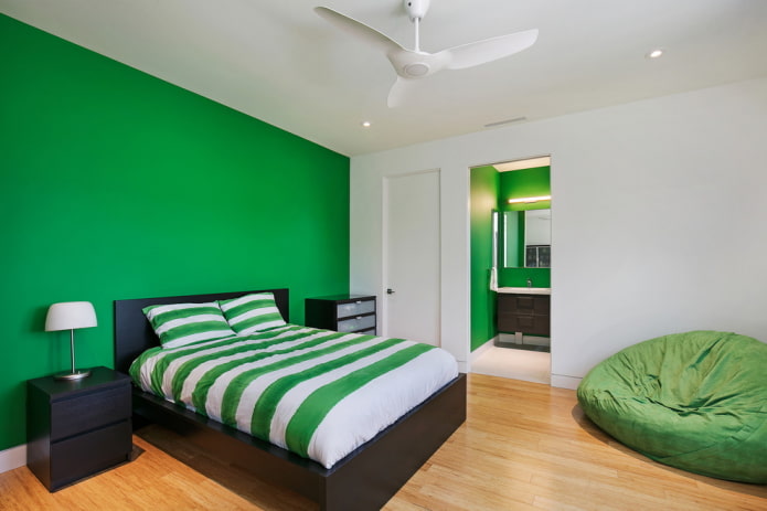 furniture in the interior of the bedroom in green tones
