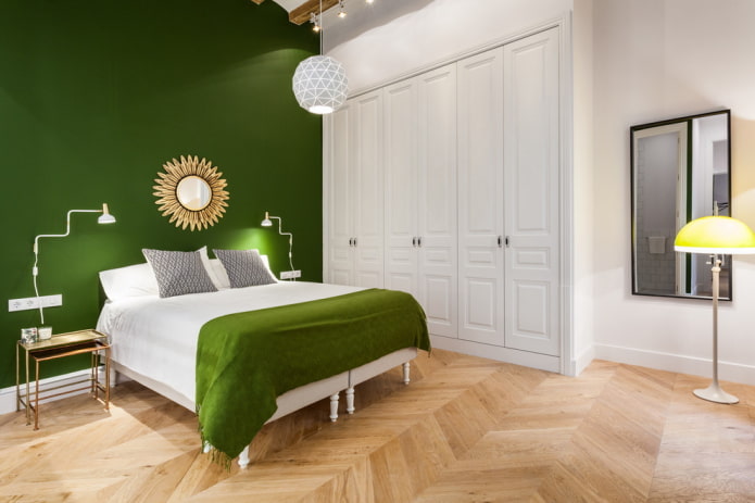 furniture in the interior of the bedroom in green tones