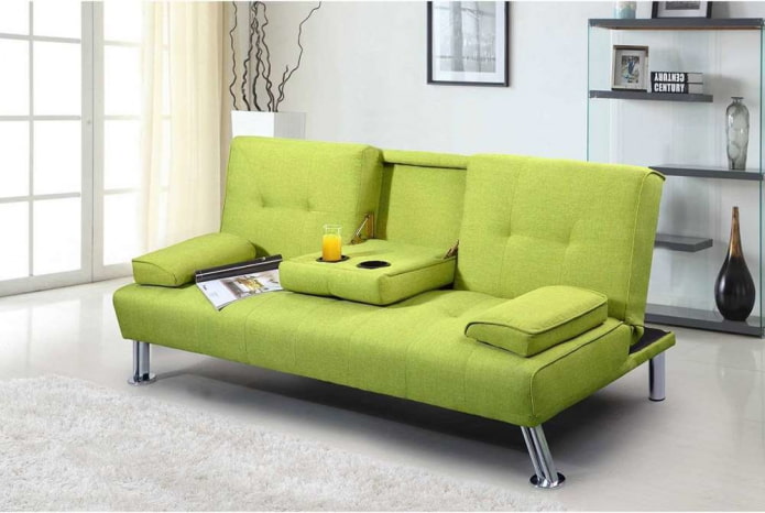 green book-sofa in the interior
