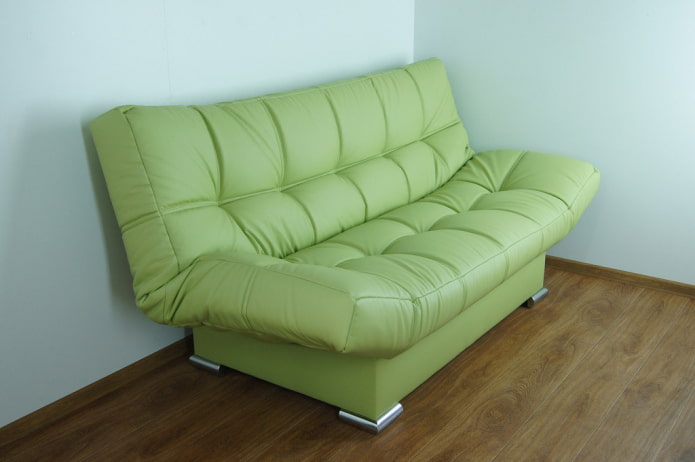 green click-clack sofa in the interior