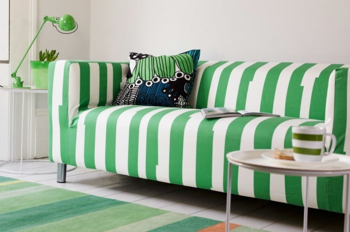sofa with green striped upholstery in the interior