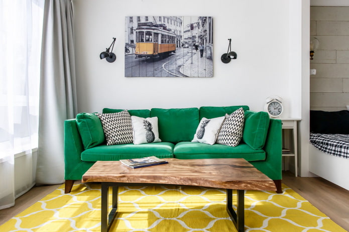 green sofa in combination with a carpet