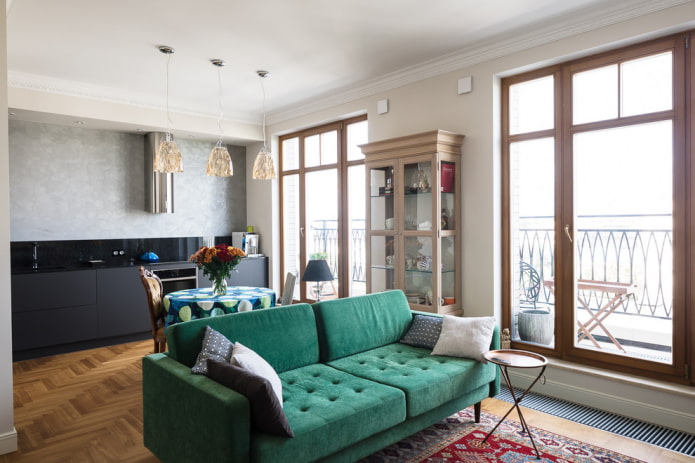 straight green sofa in the interior