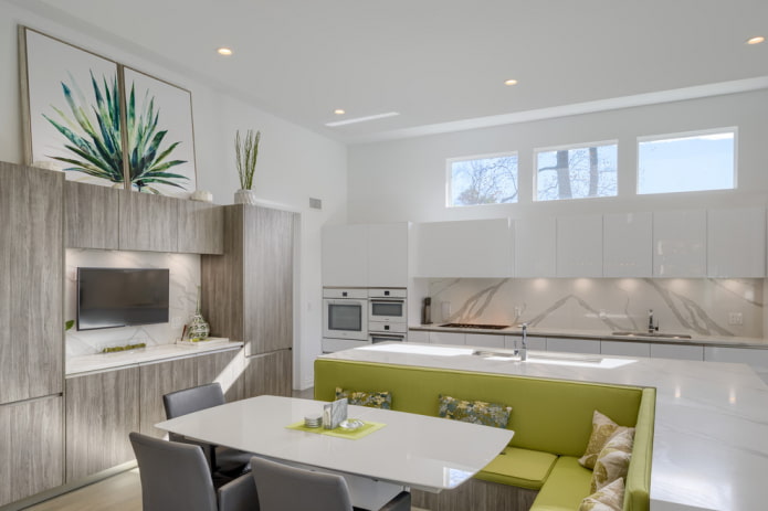 green sofa in the kitchen interior