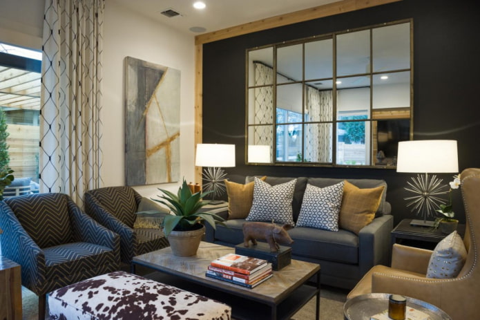mirror above the sofa in the interior of the hall