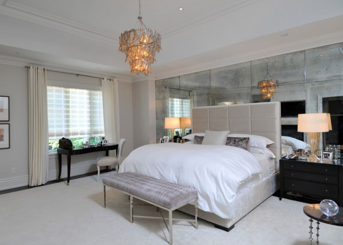 mirror panels on an accent wall in the bedroom