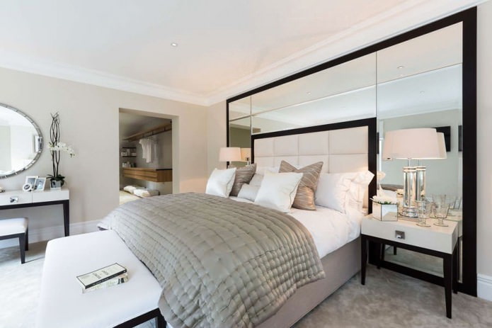 mirror panels on the wall in the bedroom