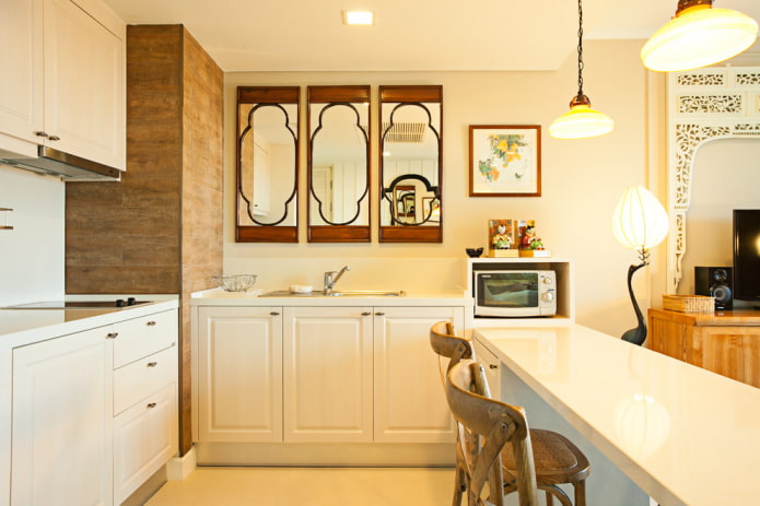 mirrors above the sink in the kitchen interior