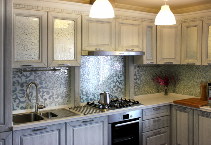 a mirror with drawings in the kitchen interior