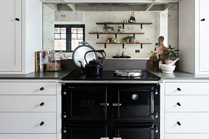 mirror above the stove in the kitchen interior