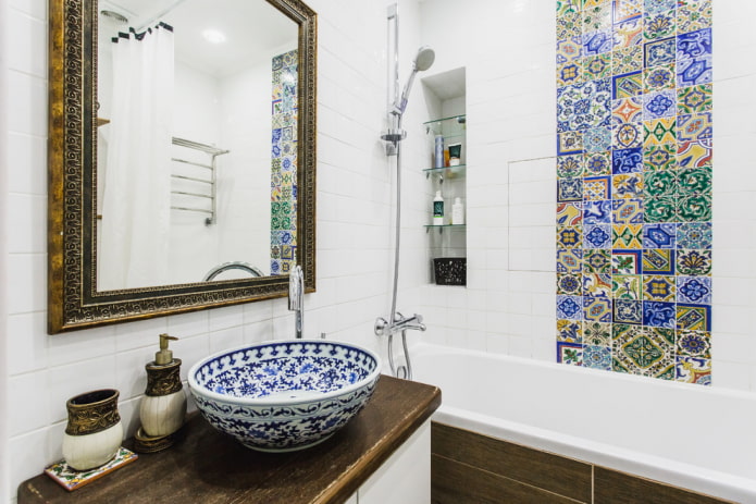 mirror in a baguette frame in the bathroom interior