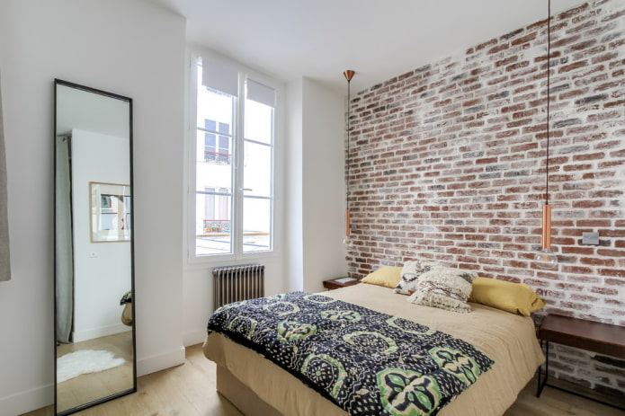 mirror in the bedroom in the loft style