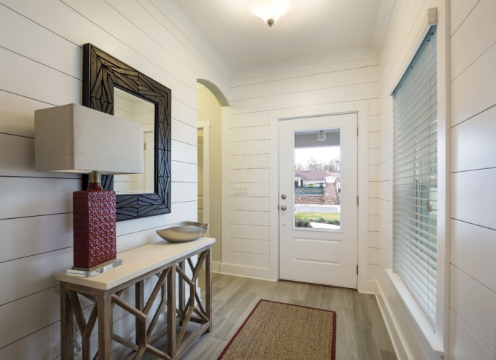 mirror in a wenge frame in the interior of the hallway