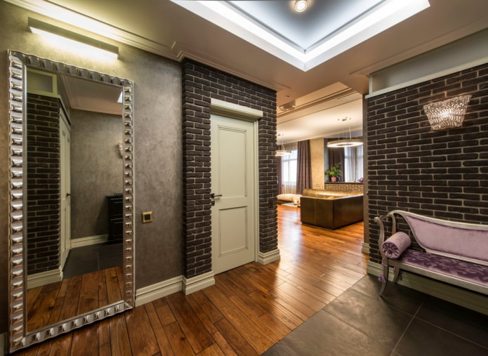 mirror in a silver frame in the interior of the hallway
