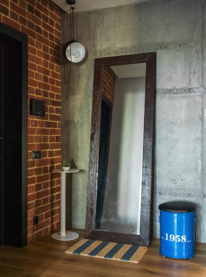 mirror in the interior of the hallway in loft style