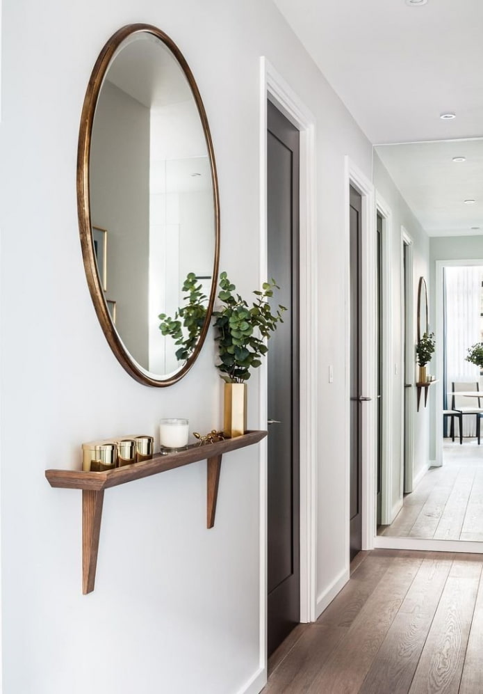oval mirror in the hallway interior